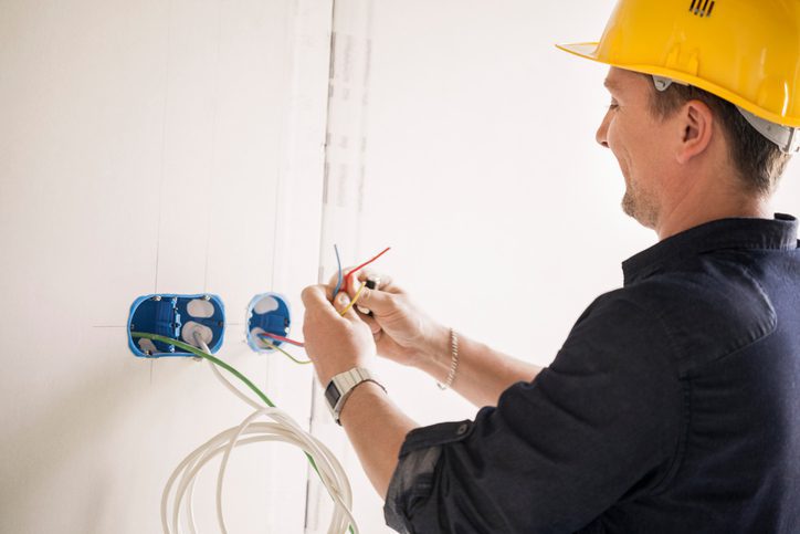 Electrician working at site